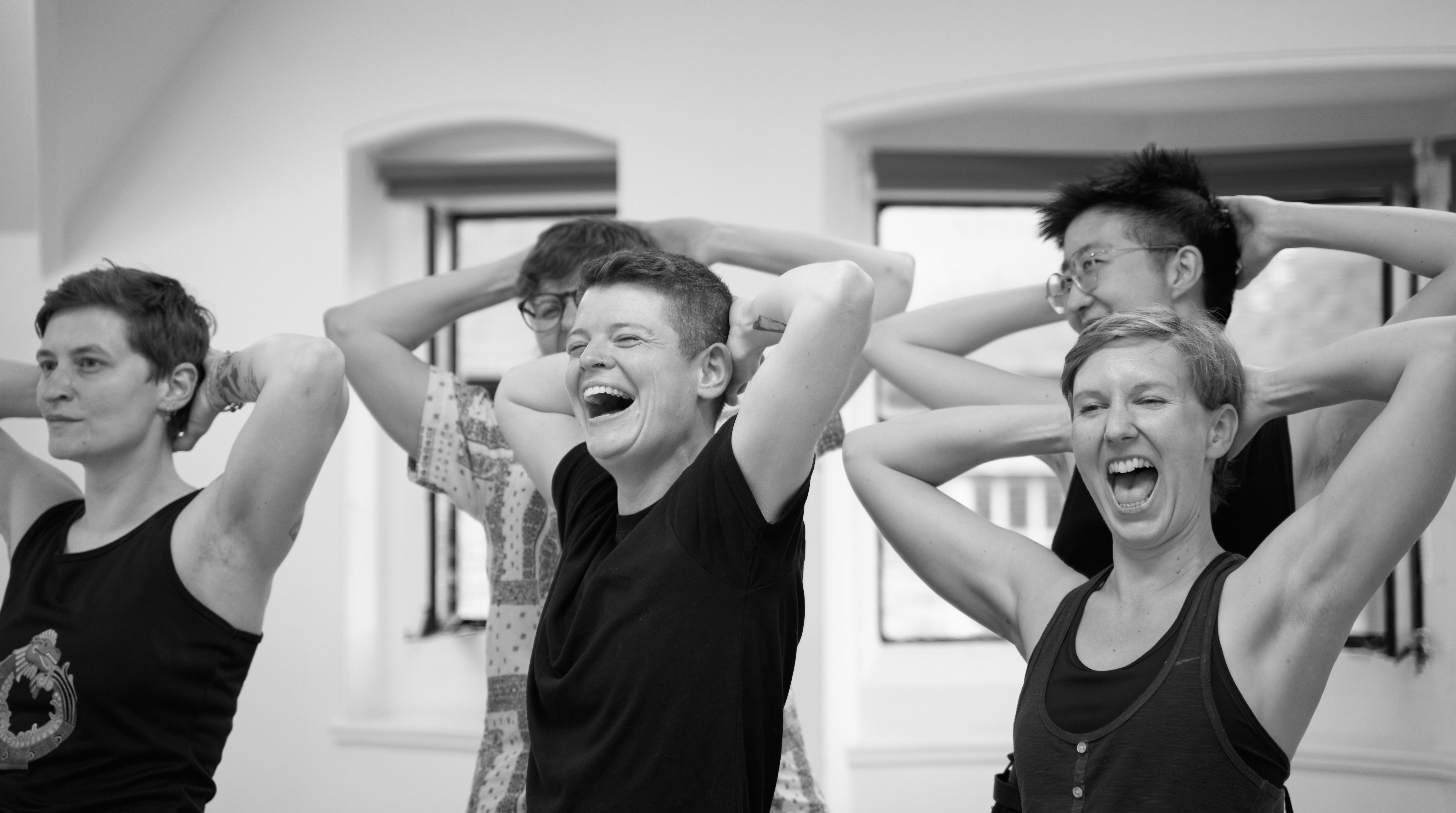 People in a studio laughing