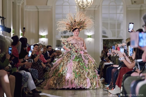 Shot of a woman in a floral ballgown